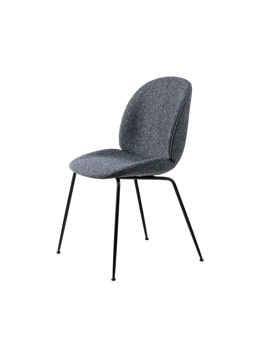 Beetle blue velvet upholstered chair with metal legs, elegant design, suitable for modern interiors.