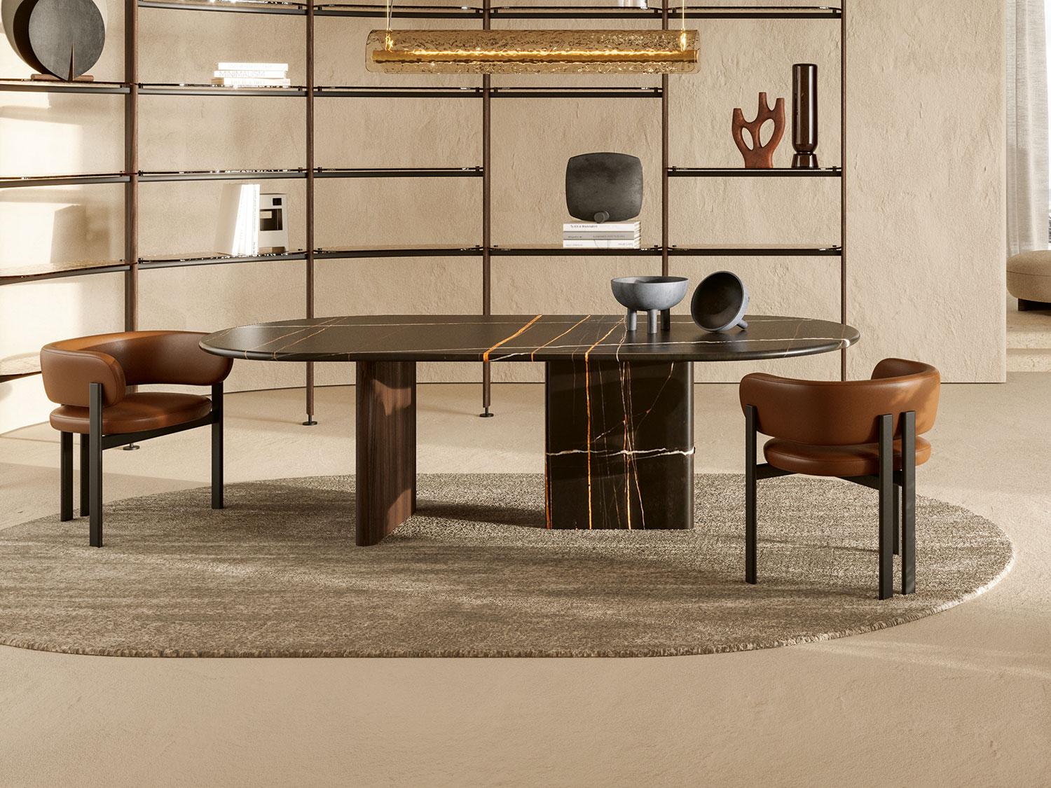 Modern dining room featuring Mailea Taba suni deri kollu lake sandalye with a sleek oval table and contemporary decor.