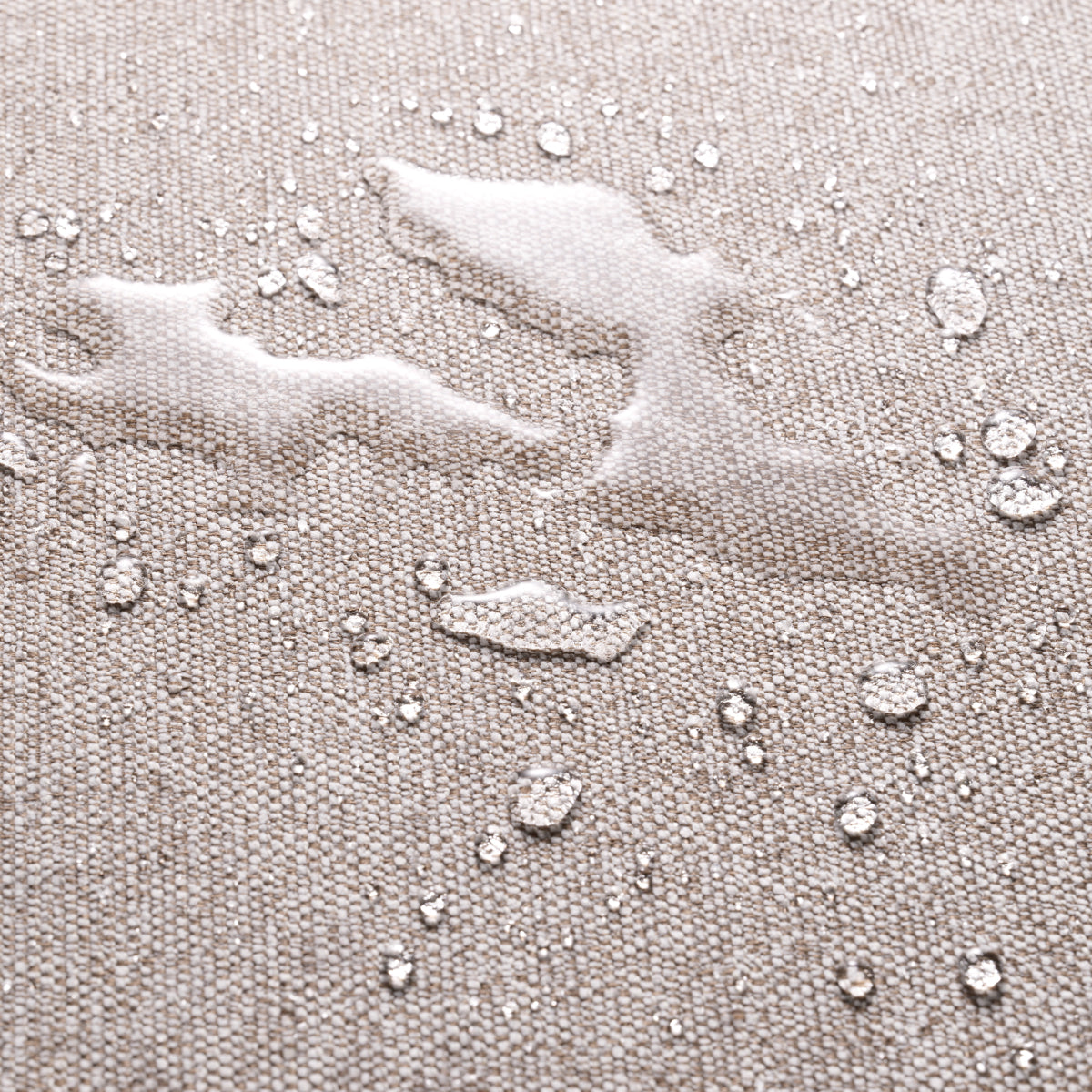Water-resistant fabric close-up with droplets, showcasing durability for outdoor and garden use.