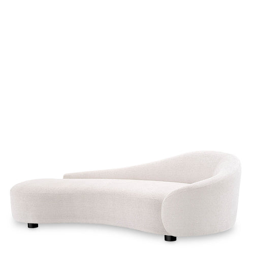 Rivolo krem rengi keten kumaşlı oval formlu daybed, siyah ahşap ayaklarla şıklık sunar.