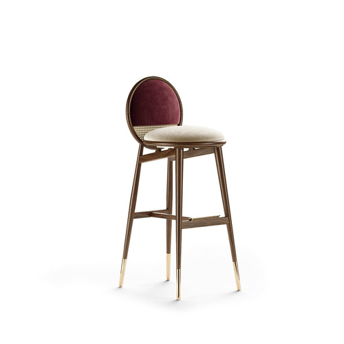 Dean bar chair with walnut legs, velvet seat in burgundy, brass footrest, elegant design for modern interiors.
