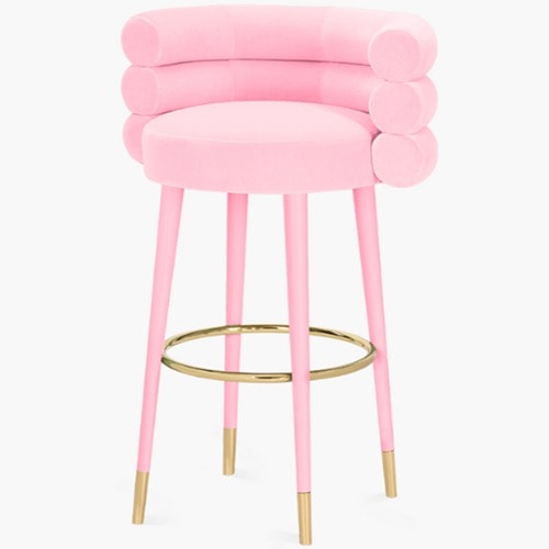 Pembe süet kumaşlı bar sandalyesi, metal detaylı ve modern tasarımıyla şık bir oturum imkanı sunar.